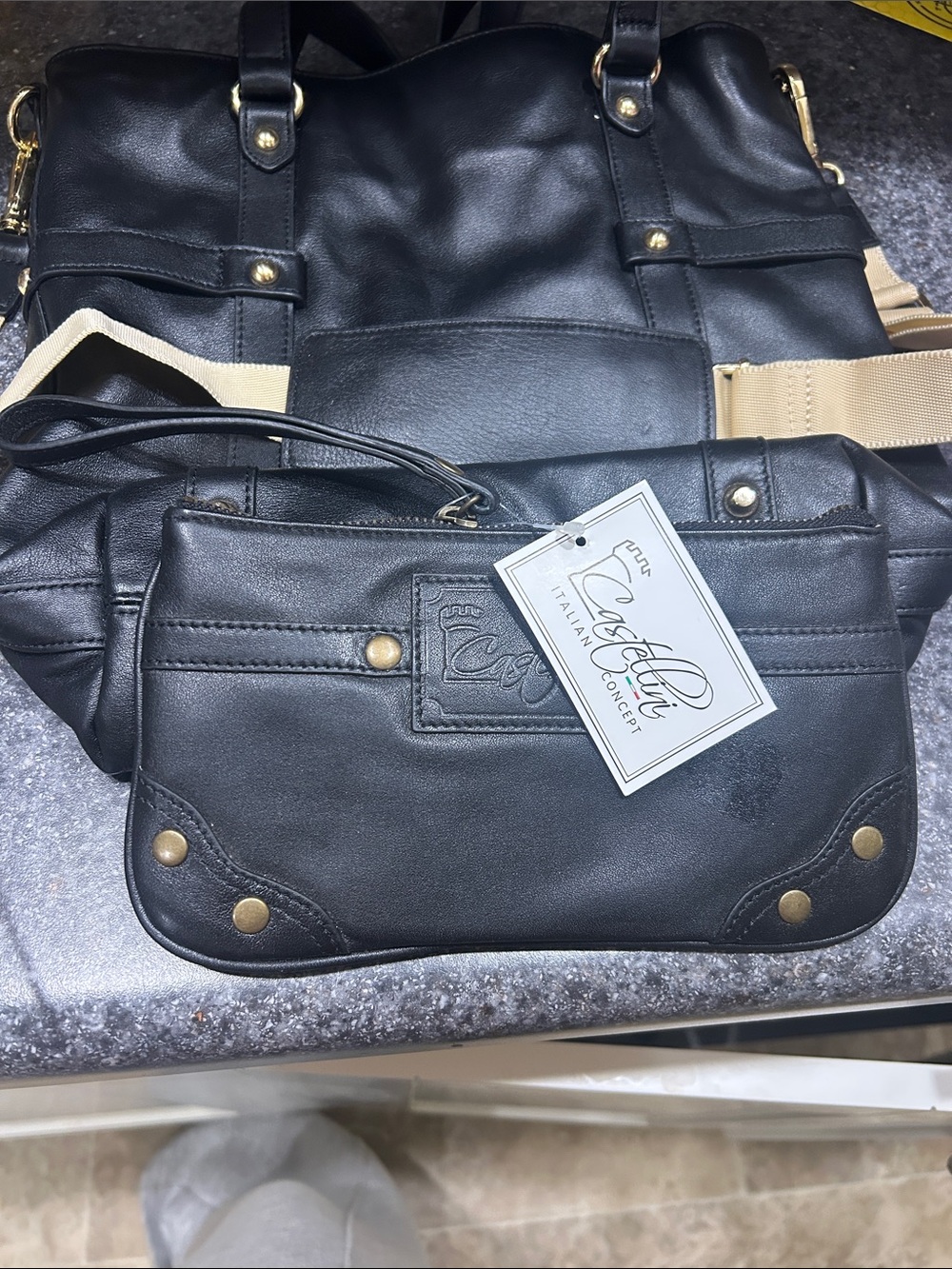 Castelli Black Leather Wristlet Clutch with Gold Accents